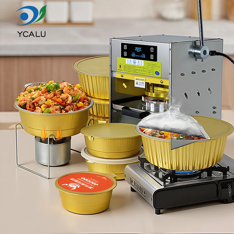 Manual Heat Sealing Machine with Gold Aluminum Foil Containers Manual Heat Sealing Machine with Gold Aluminum Foil Containers